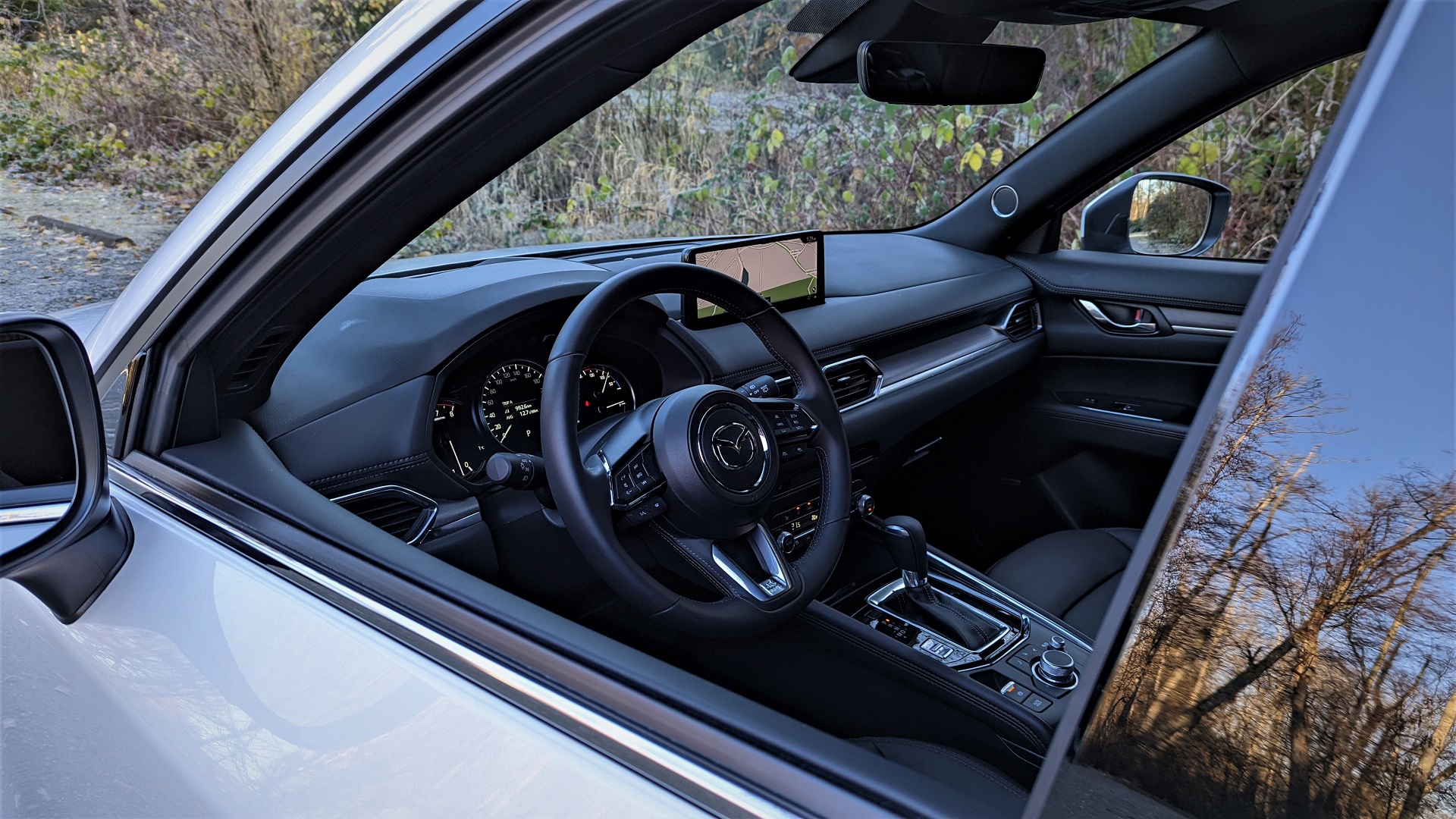 Looking inside driver's window Mazda CX-5